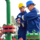 Engineer power and energy using laptop on location site